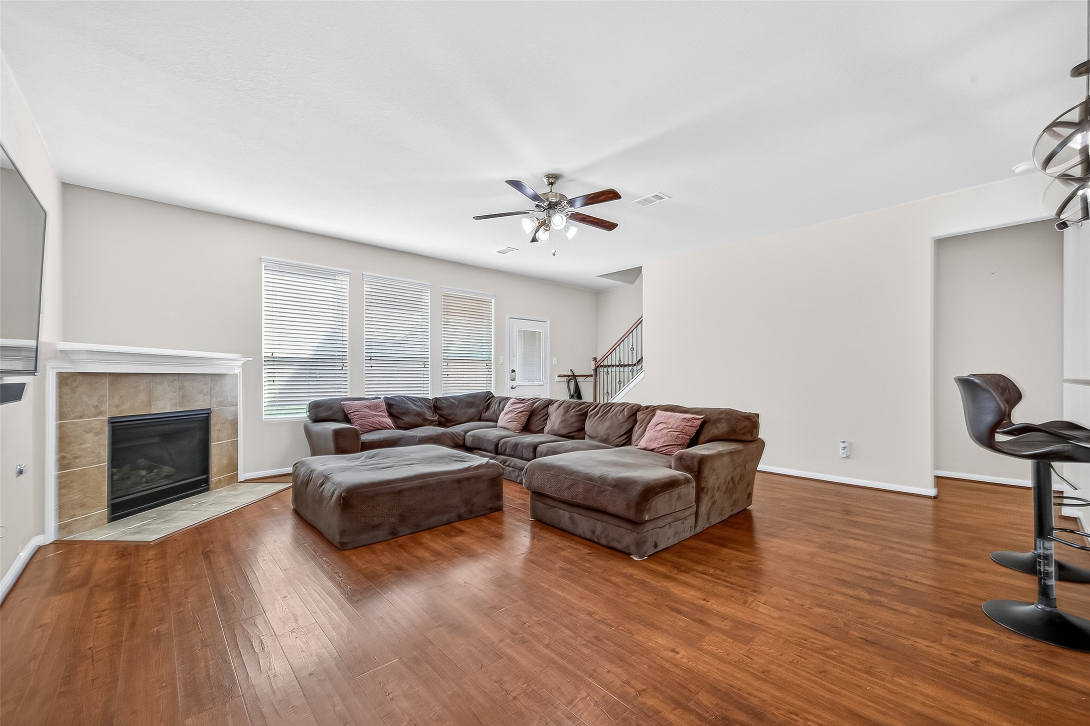 2611 Cottage Step Trail Fresno, TX 77545 - Photo 8 of 48 a living room with furniture and a fireplace