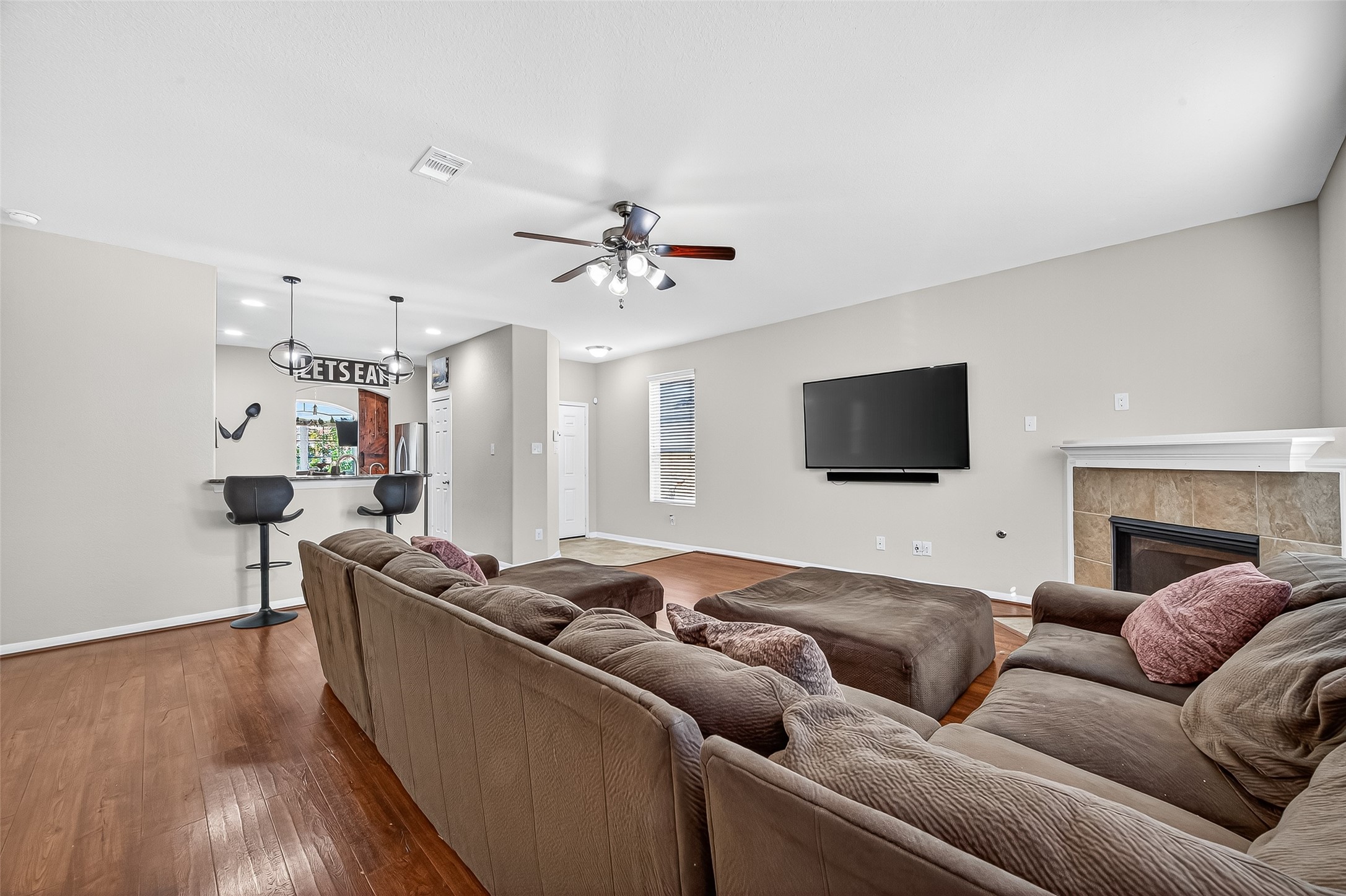 2611 Cottage Step Trail Fresno, TX 77545 - Photo 10 of 48 a living room with furniture and a flat screen tv