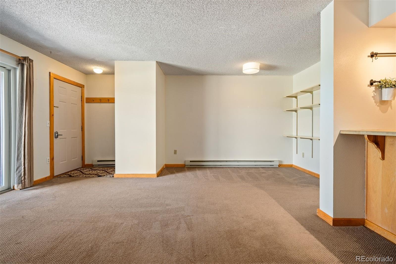 76 E Meadow, Unit 2 Fraser, CO 80442 - Photo 7 of 23 a view of an empty room with a window