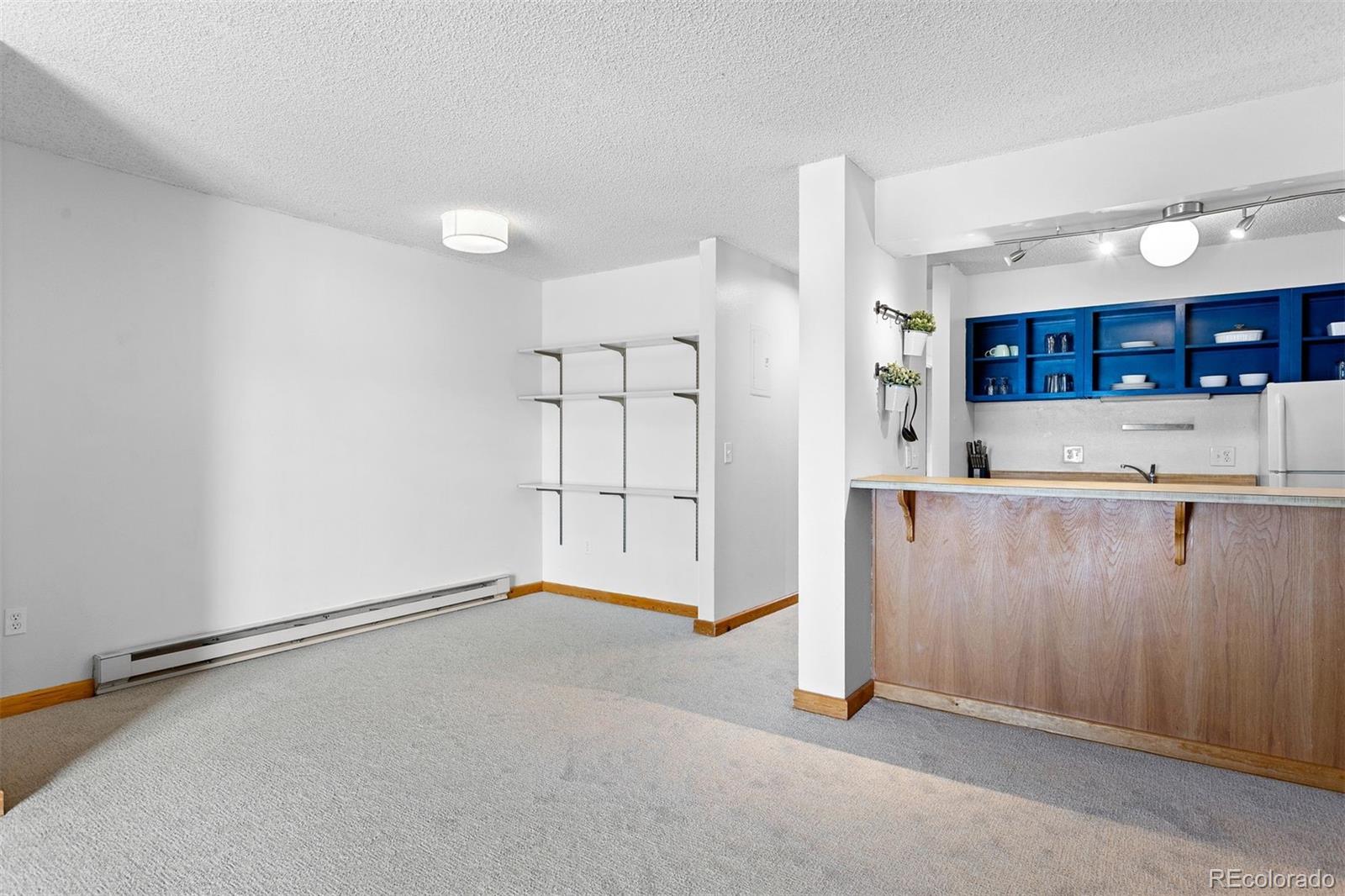 76 E Meadow, Unit 2 Fraser, CO 80442 - Photo 9 of 23 a view of a kitchen with a sink