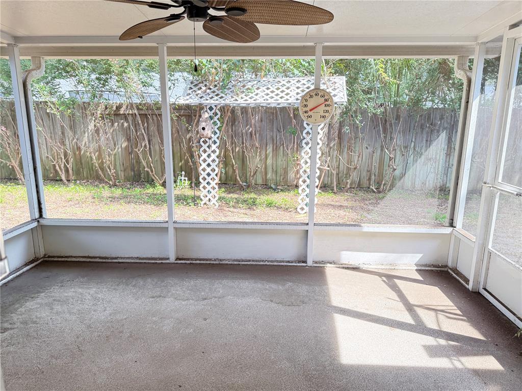 4262 Northeast 35th Avenue Road Ocala, FL 34479 - Photo 22 of 28 a view of room with a floor to ceiling window and a yard