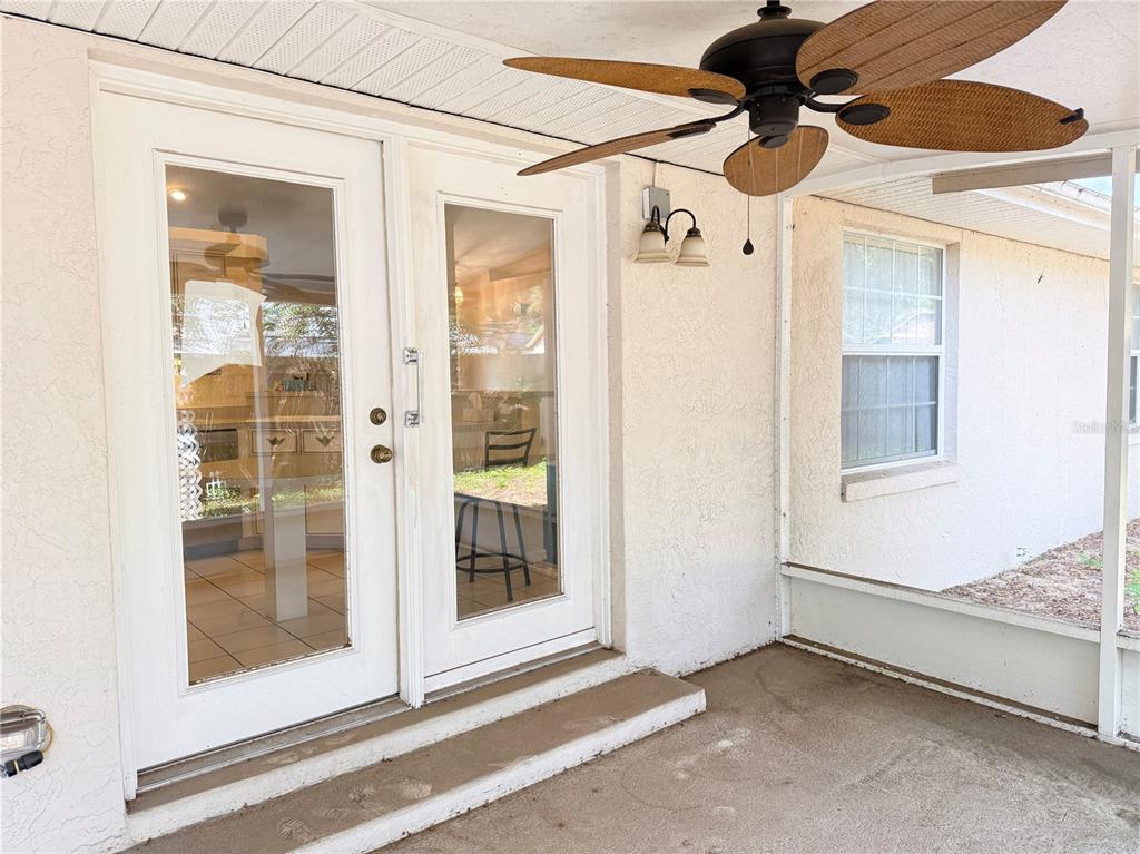 4262 Northeast 35th Avenue Road Ocala, FL 34479 - Photo 24 of 28 a view of a hallway with a glass door and a window