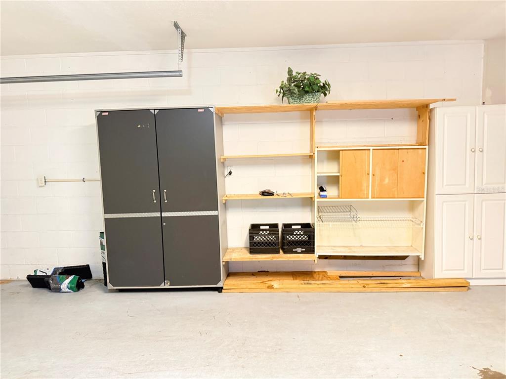 4262 Northeast 35th Avenue Road Ocala, FL 34479 - Photo 28 of 28 a view of a kitchen with furniture and a window