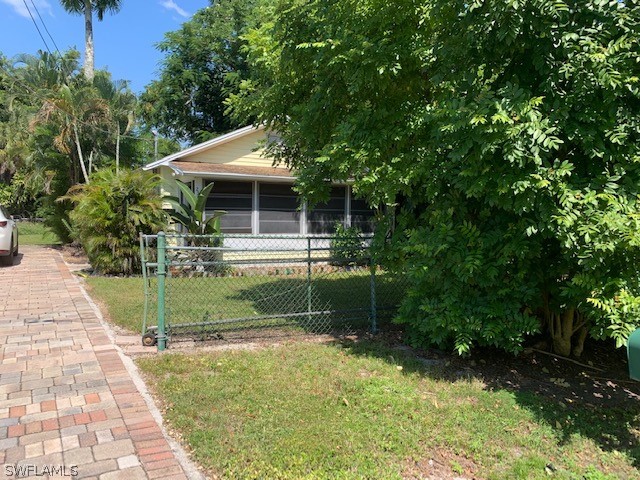 a view of backyard with green space