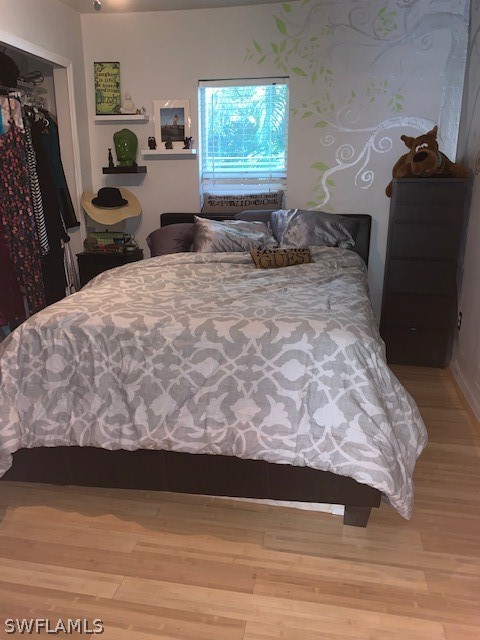 2307 Unity Avenue Fort Myers, FL 33901 - Photo 16 of 25 a bedroom with a bed and a window