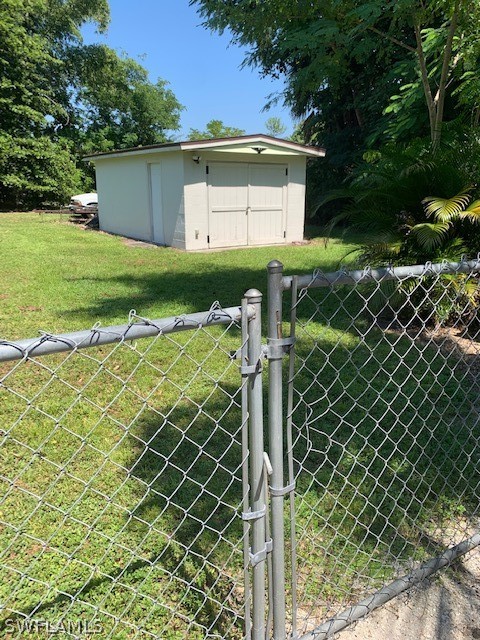 2307 Unity Avenue Fort Myers, FL 33901 - Photo 19 of 25 a front view of a house having yard
