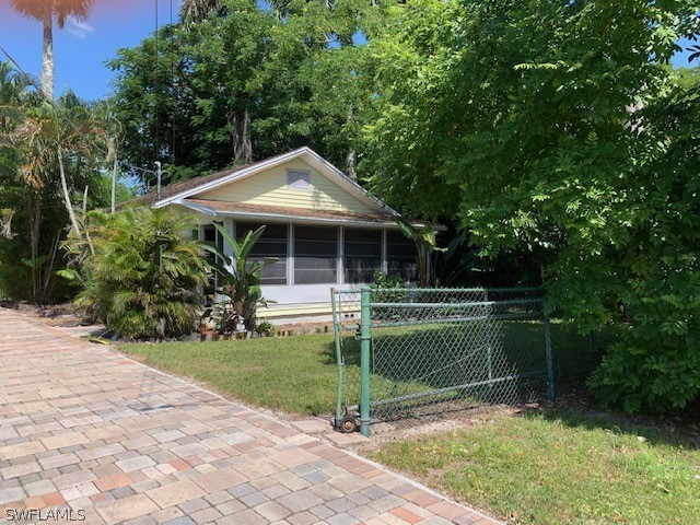 2307 Unity Avenue Fort Myers, FL 33901 - Photo 2 of 25 a view of a house with backyard
