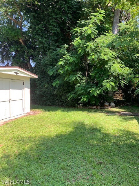 2307 Unity Avenue Fort Myers, FL 33901 - Photo 21 of 25 a view of a back yard of the house
