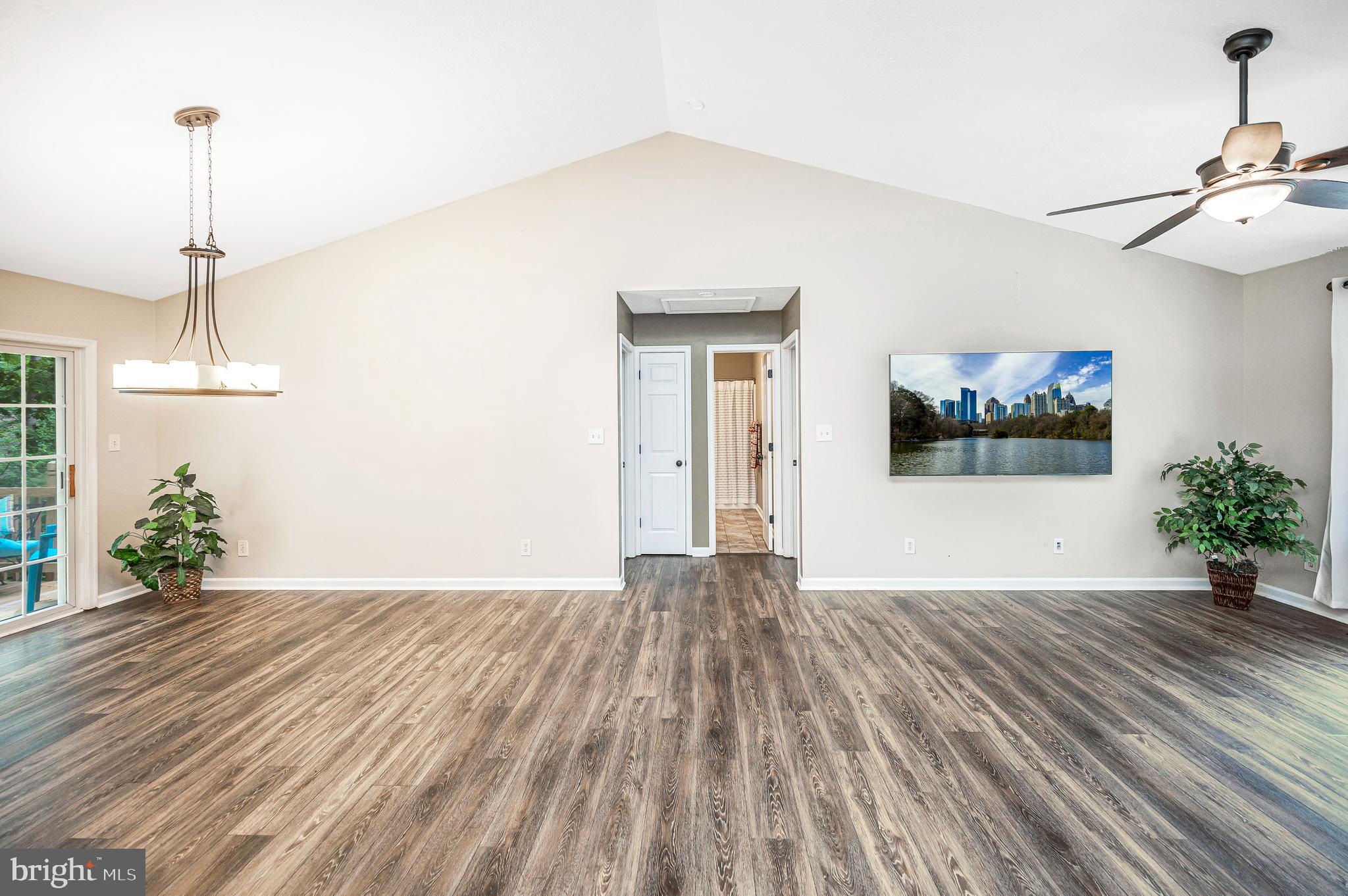 305 Birdie Road Locust Grove, VA 22508 - Photo 7 of 64 great room with dining left & living right