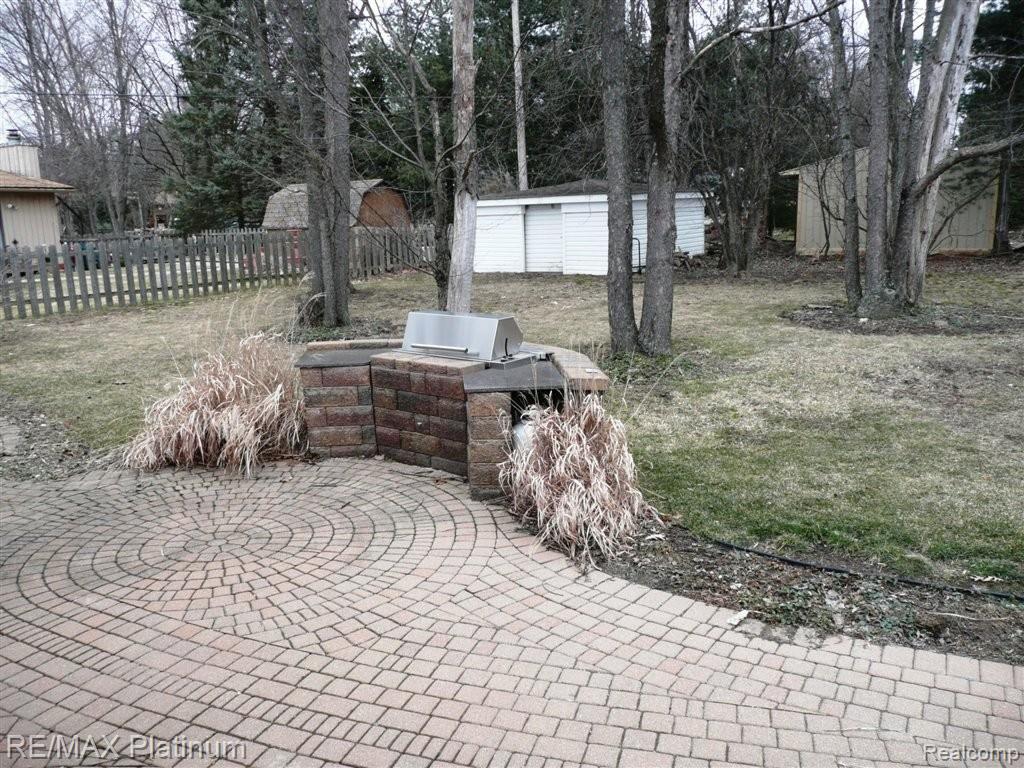 2422 Pleasant Ridge Howell, MI 48843 - Photo 16 of 17 Patio w/Grill