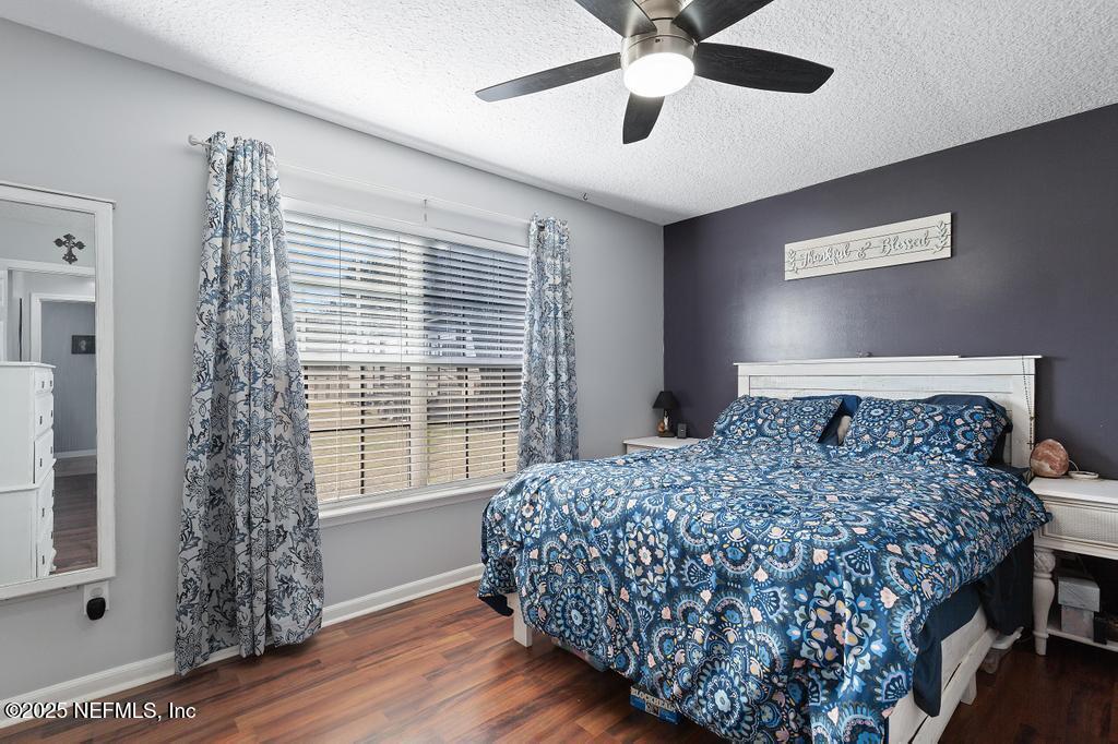 54170 Church Road Callahan, FL 32011 - Photo 29 of 44 a bedroom with a bed and a window