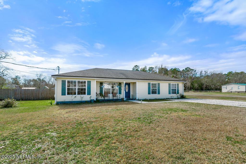 54170 Church Road Callahan, FL 32011 - Photo 4 of 44 a view of a house with a yard
