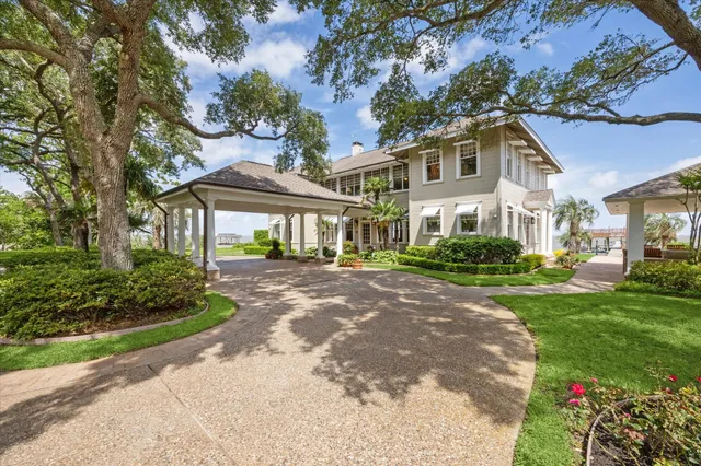 front view of a house with a garden