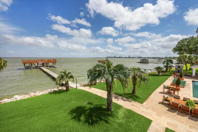 a view of a lake with a big yard