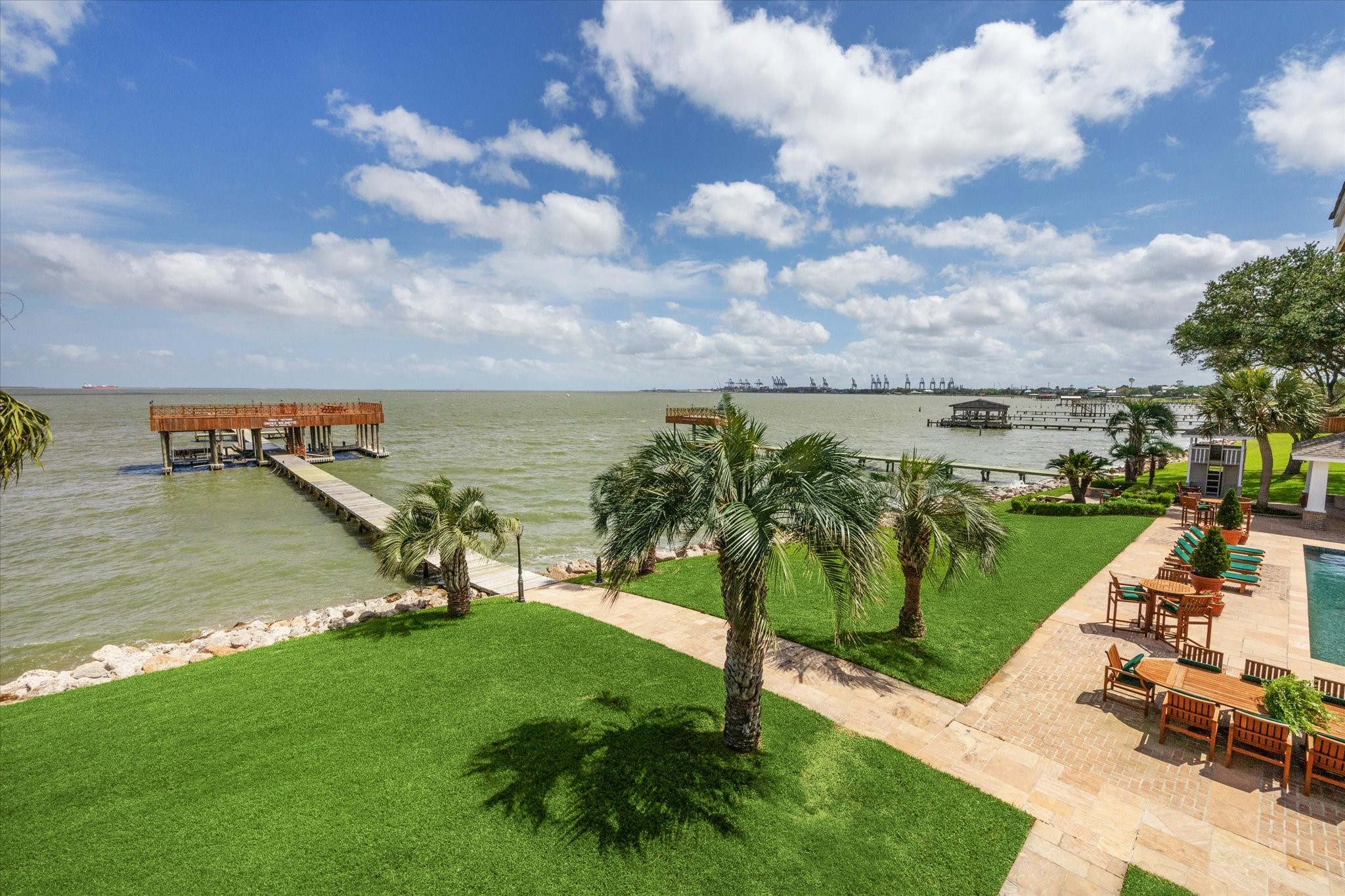 102 South R Street La Porte, TX 77571 - Photo 17 of 43 a view of a lake with a yard