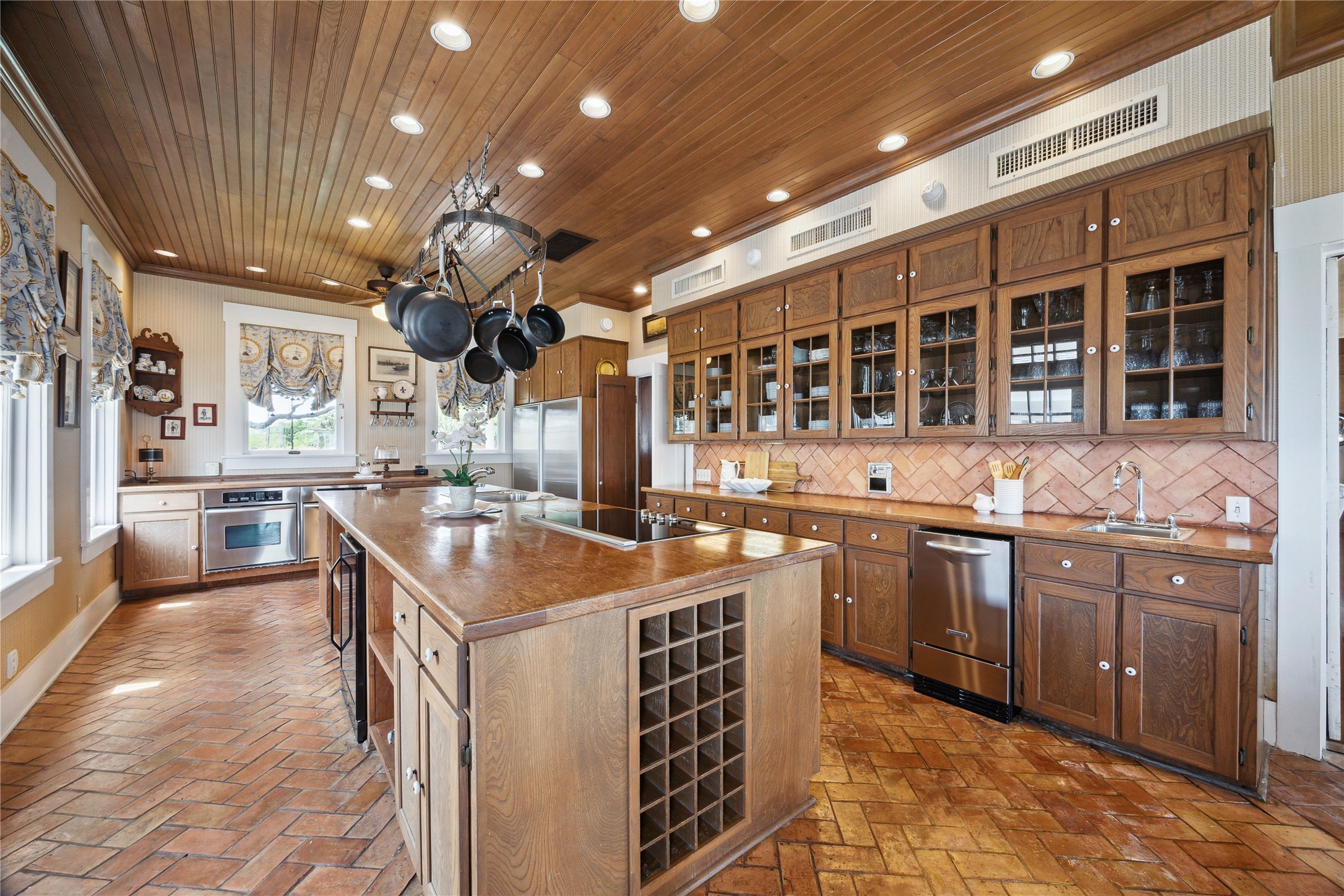 102 South R Street La Porte, TX 77571 - Photo 25 of 43 a kitchen with stainless steel appliances granite countertop a sink and a stove