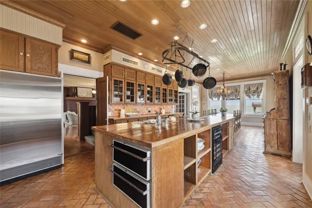 a room with lots of wooden furniture and wooden floors