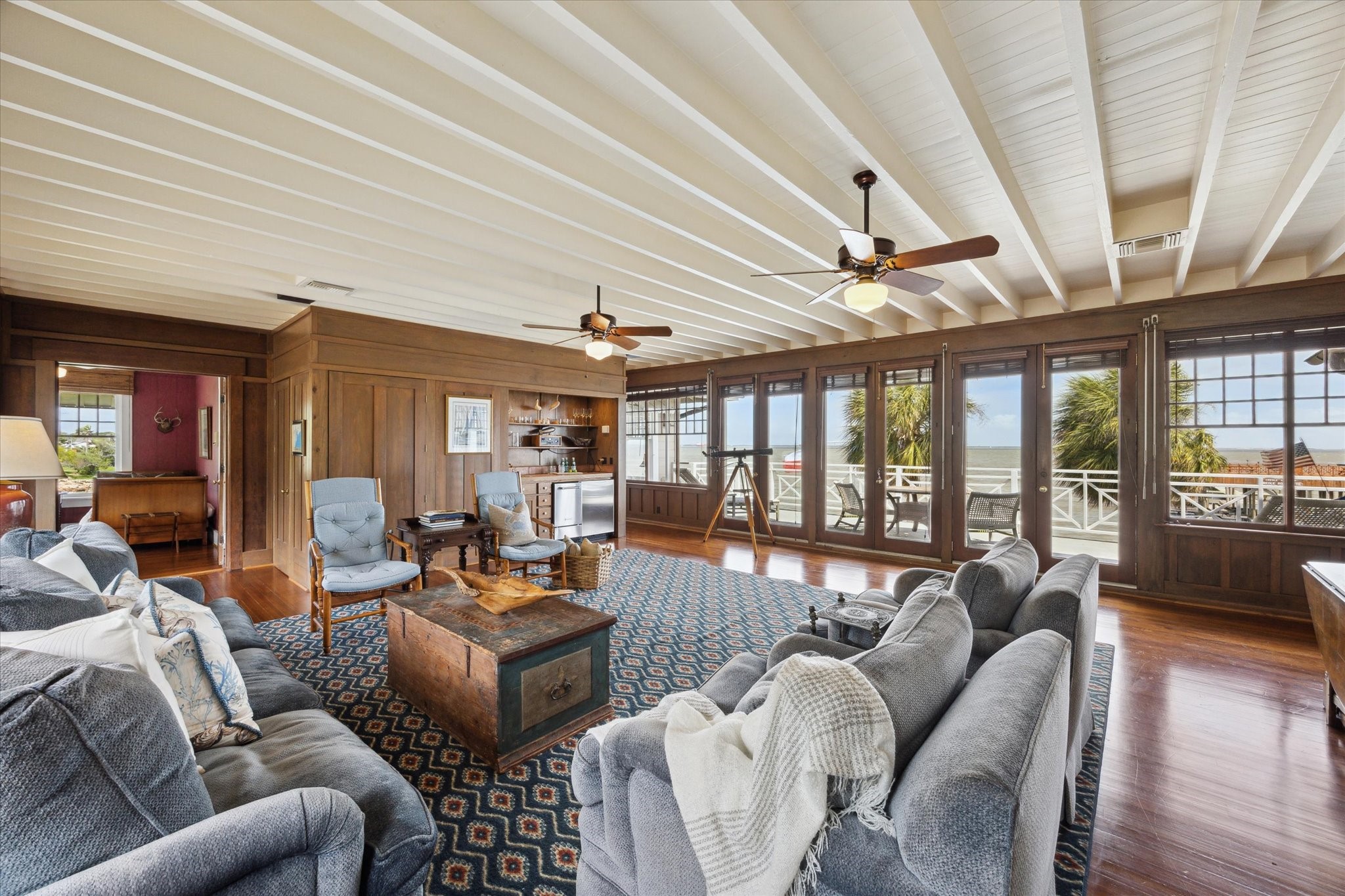 102 South R Street La Porte, TX 77571 - Photo 32 of 43 a living room with furniture floor to ceiling window and wooden floor