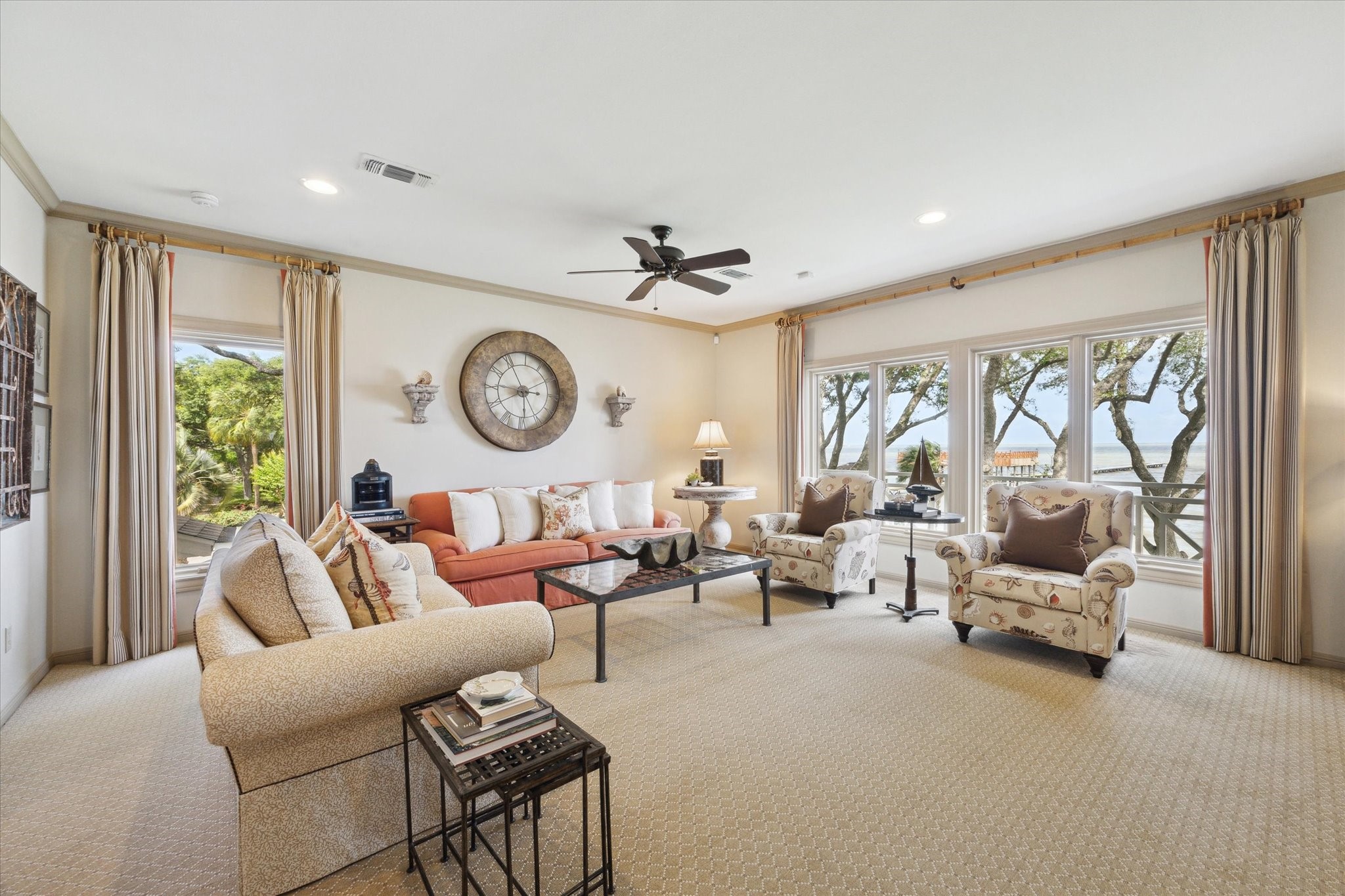 102 South R Street La Porte, TX 77571 - Photo 37 of 43 a living room with furniture a clock and a large window