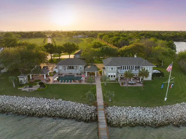 a view of a town with mountains in the background