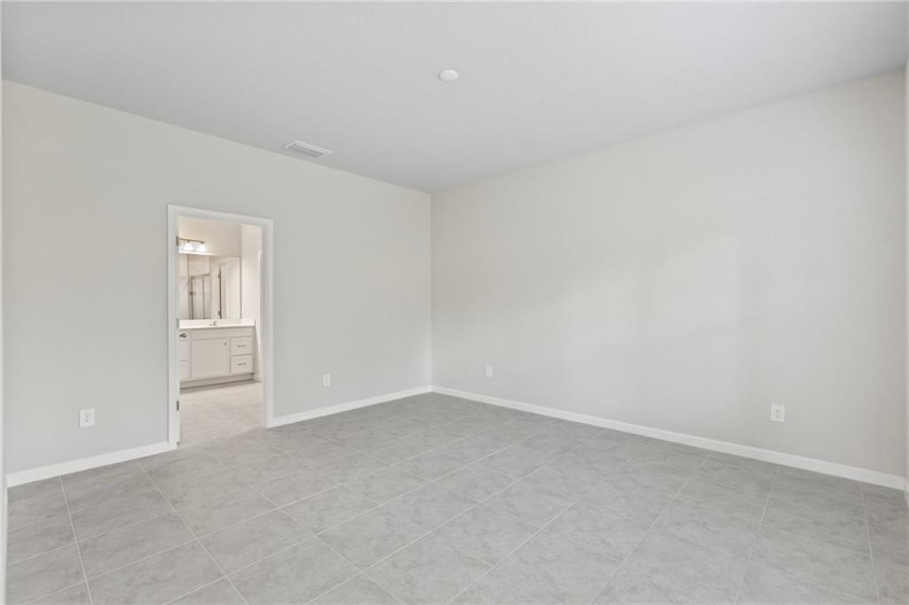 6710 Rumine Circle Vero Beach, FL 32967 - Photo 18 of 28 a view of an empty room