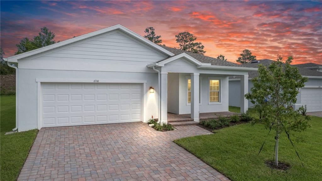 6710 Rumine Circle Vero Beach, FL 32967 - Photo 25 of 28 front view of house with a yard