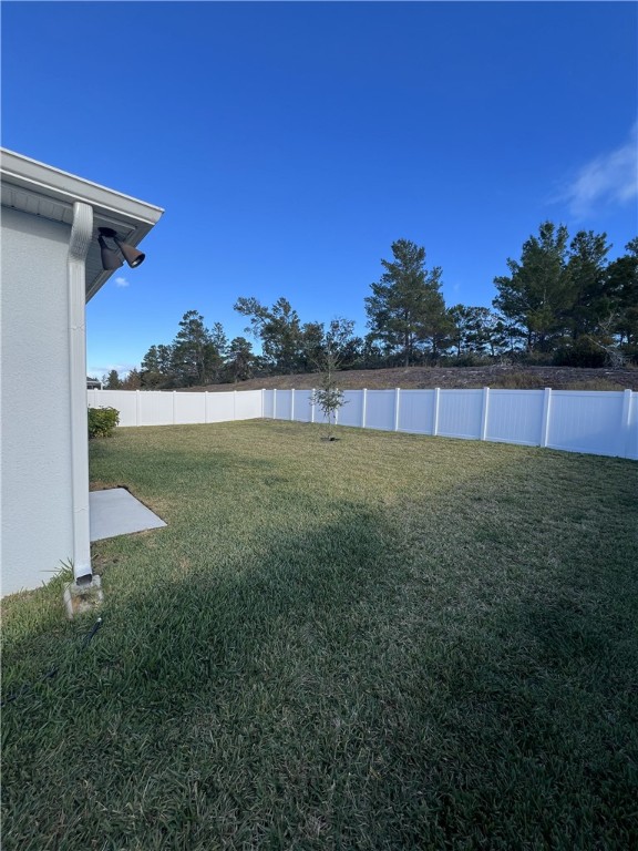 6710 Rumine Circle Vero Beach, FL 32967 - Photo 5 of 28 a view of lake from a yard