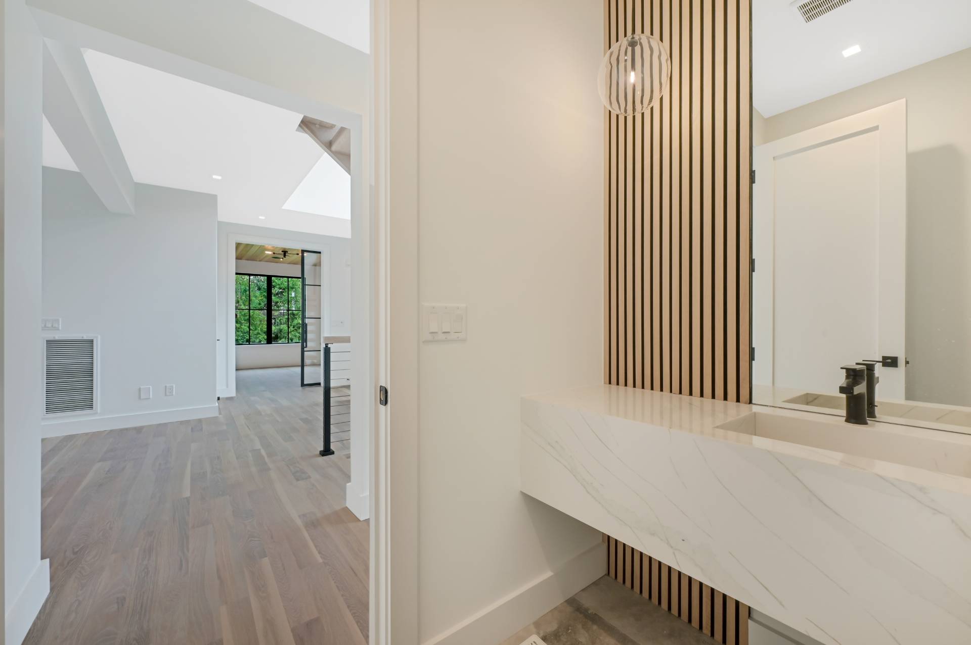 69 Ridge Drive Sag Harbor, NY 11963 - Photo 18 of 35 a view of a room with wooden floor and windows