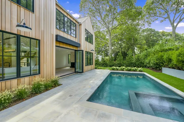 a view of swimming pool with patio