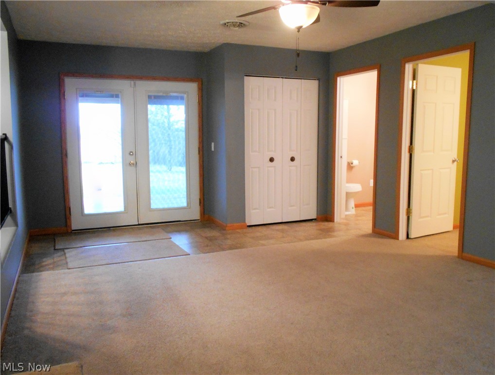 4370 School House Road Little Hocking, OH 45742 - Photo 13 of 35 From the family room you can access bedroom #3, the 2nd full bath & walk out to the back deck.