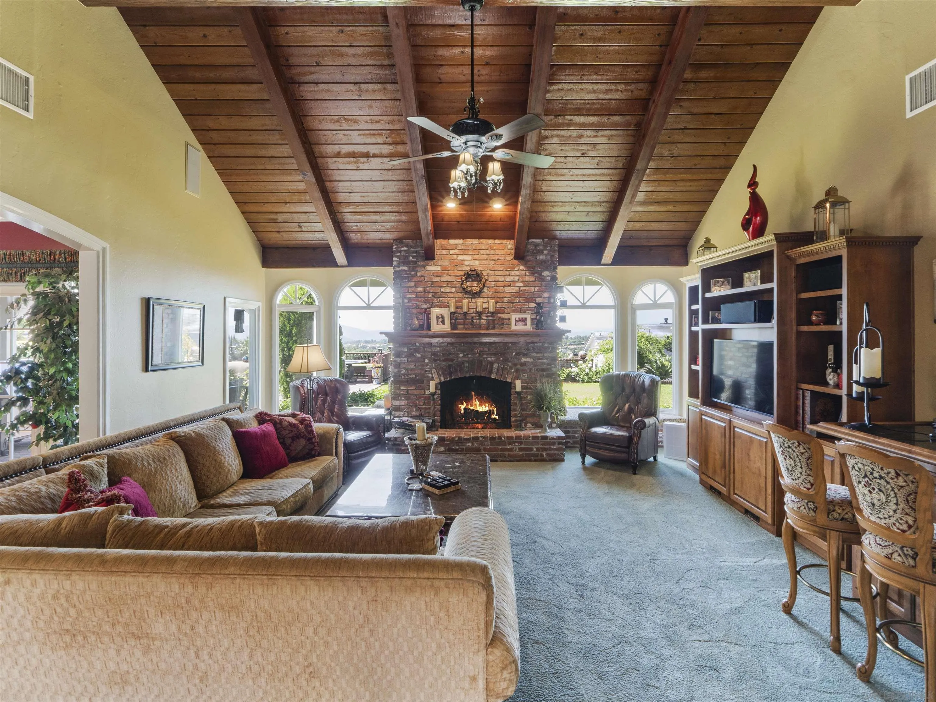 17502 Corte Lomas Verdes Poway, CA 92064 - Photo 11 of 69 a living room with furniture and a fireplace