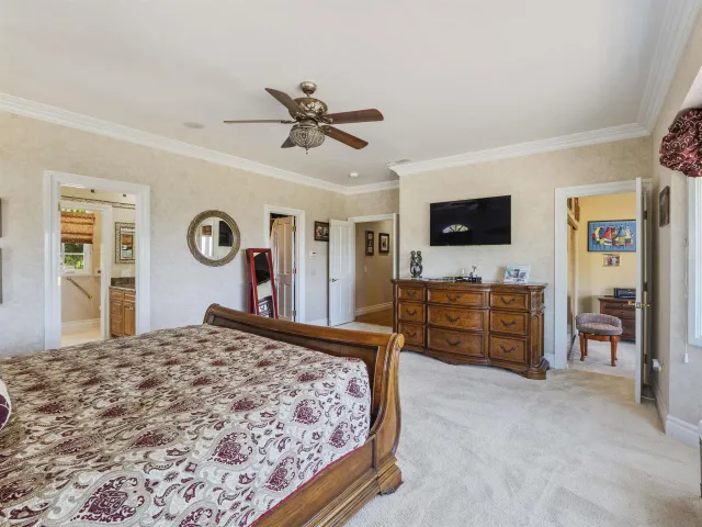 a spacious bathroom with a tub and a window