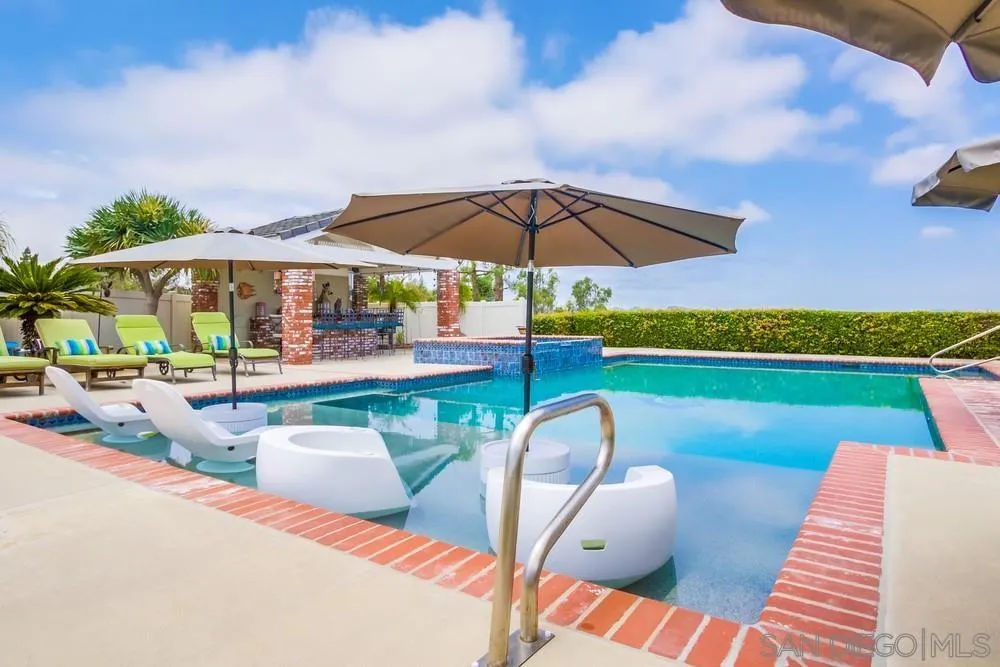 17502 Corte Lomas Verdes Poway, CA 92064 - Photo 46 of 69 a view of a swimming pool with a patio