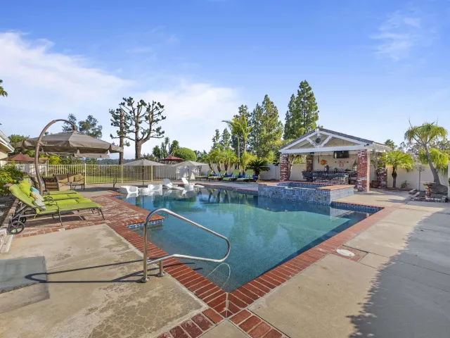 an aerial view of house with a yard
