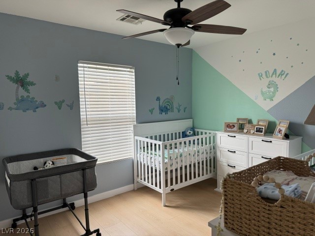 5171 Piazza Cavour Drive Las Vegas, NV 89156 - Photo 10 of 13 Naturally illuminated nursery with smooth light-toned flooring.