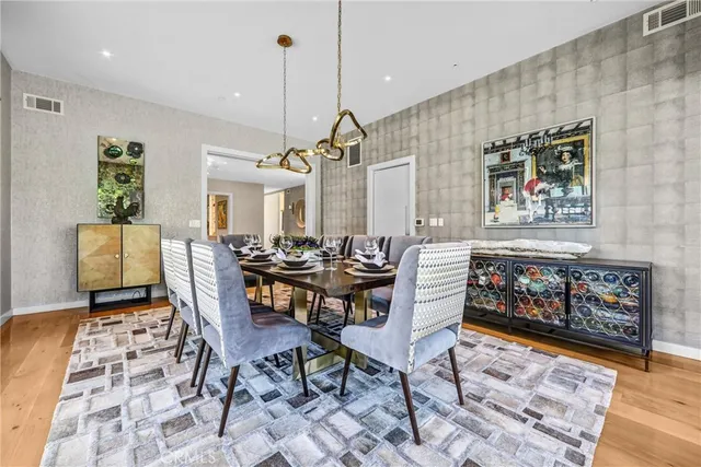 a dinning area with pool table and windows