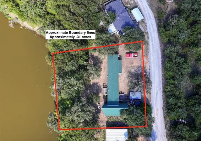 an outdoor space with seating area and flowers