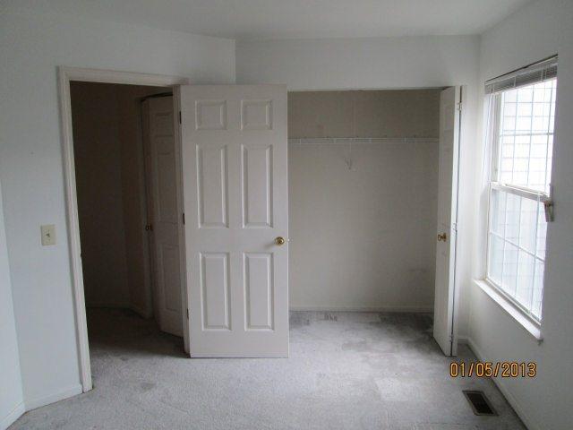 1074 Stillwater Road Elgin, IL 60120 - Photo 8 of 11 an empty room with windows