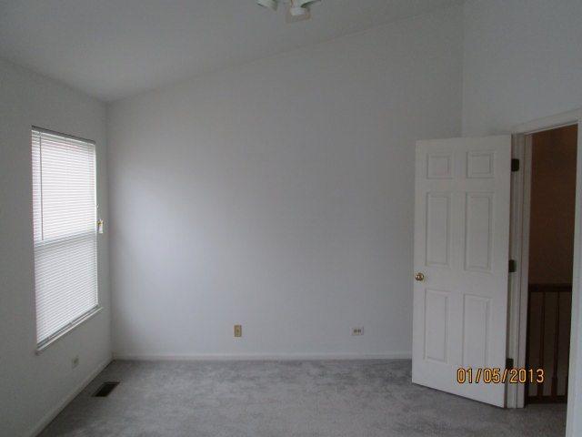 1074 Stillwater Road Elgin, IL 60120 - Photo 10 of 11 an empty room with closet
