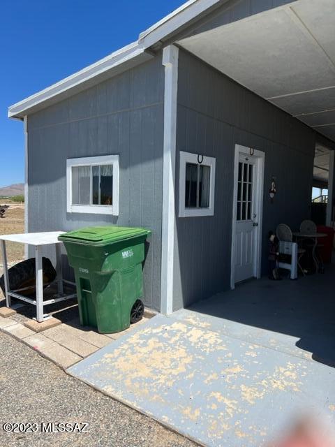 1343 Taylor Road Willcox, AZ 85643 - Photo 16 of 24 a backyard of a house with table and chairs