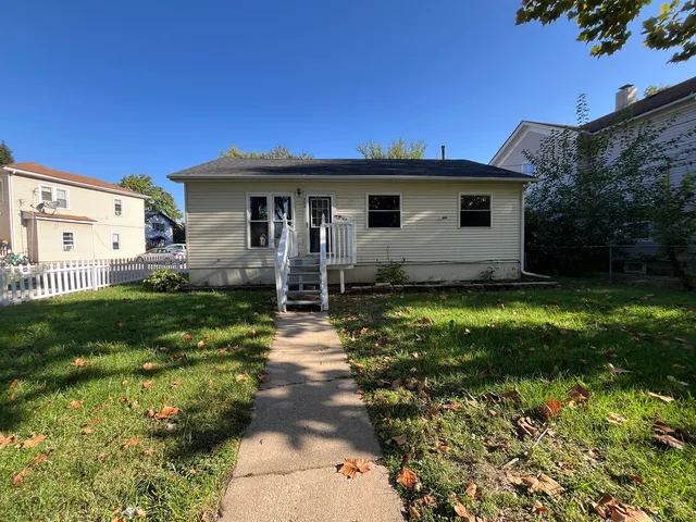 a house view with a garden space