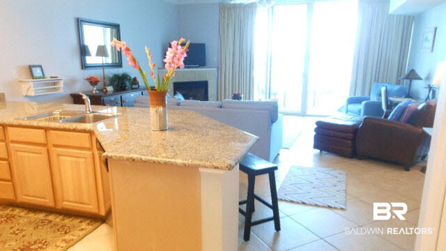27800 Canal Road, Unit 214 Orange Beach, AL 36561 - Photo 5 of 6 Views from floor to ceiling glass! Large tile floors thru-out except carpet in BR.