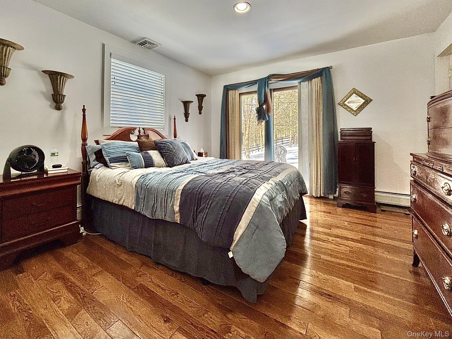 71 Frost Road Rhinebeck, NY 12572 - Photo 21 of 32 Primary open to private bath and out to stone patio