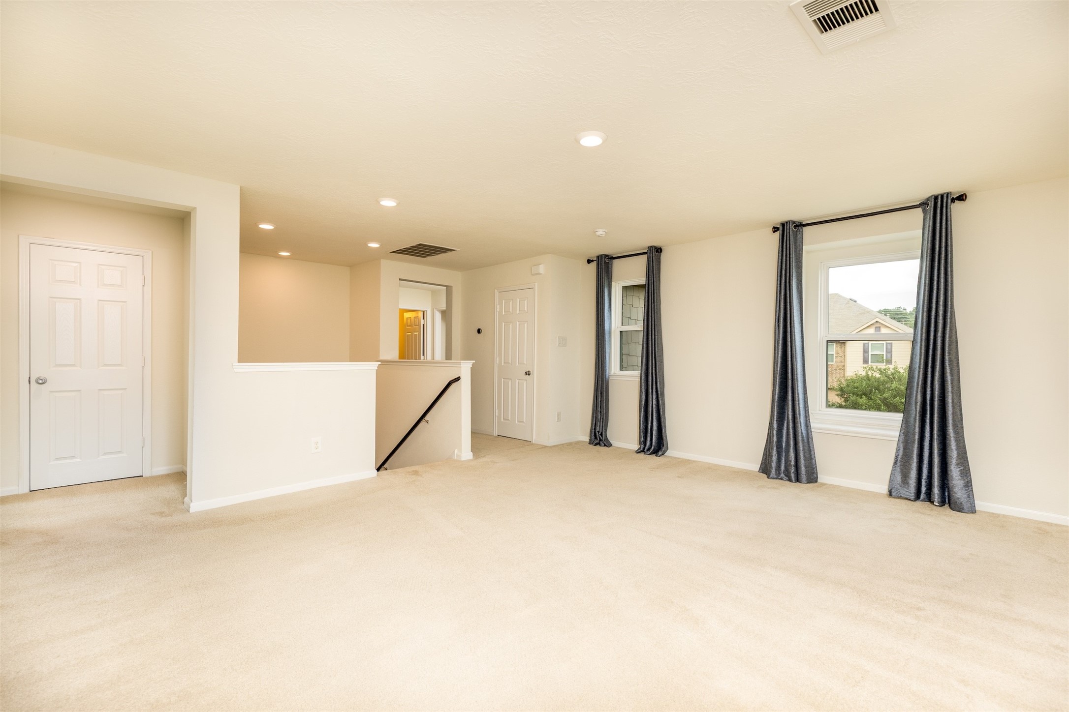 15623 Hanover Breeze Lane Houston, TX 77044 - Photo 21 of 46 a view of an empty room with a window