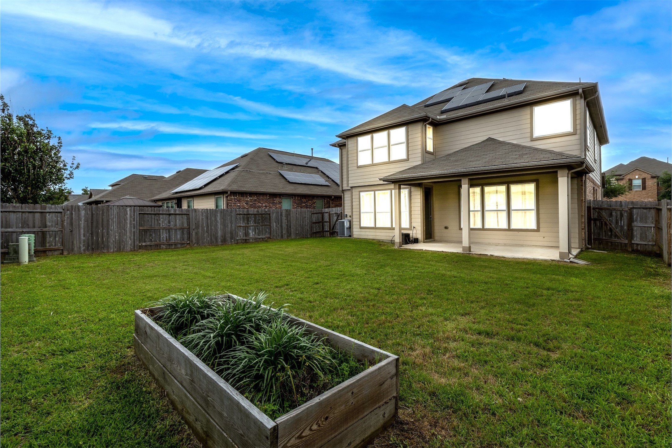 15623 Hanover Breeze Lane Houston, TX 77044 - Photo 34 of 46 a front view of a house with garden