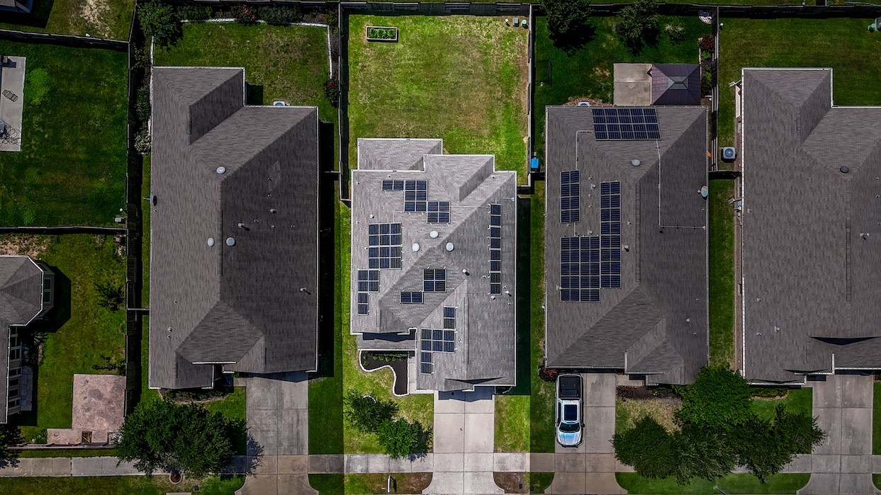 15623 Hanover Breeze Lane Houston, TX 77044 - Photo 37 of 46 an aerial view of multiple houses with a yard