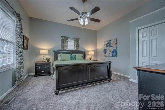 116 7th Street Cramerton, NC 28032 - Photo 6 of 9 a living room with furniture and a fireplace