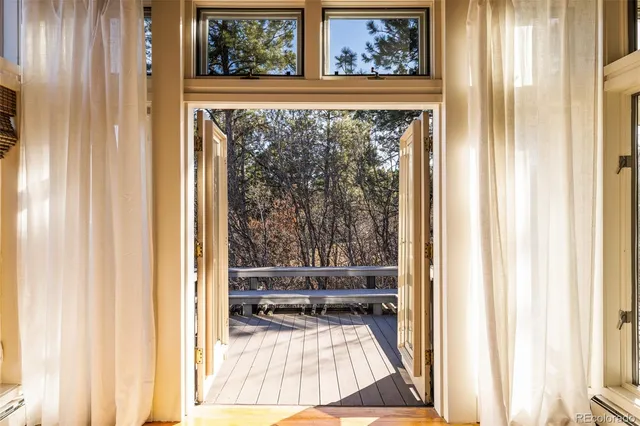 a view of a living room and a window
