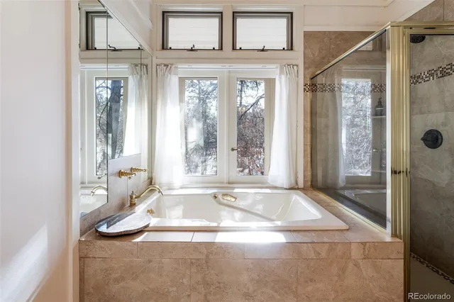 a view of a bath tub sitting in a bathroom