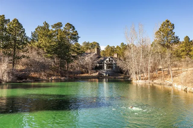 a view of a lake with a big yard